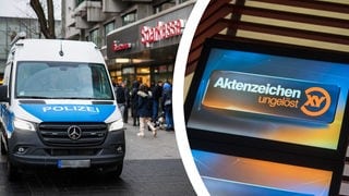 Ein Polizeiauto steht vor der Sparkasse in Gelsenkirchen in deren Tresorraum eingebrochen wurde. Der Fall ist bei Aktenzeichen XY.