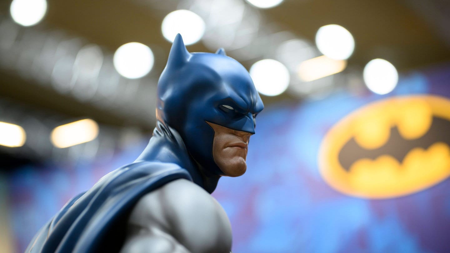 London Batman pays parking tickets and buys fuel for drivers
